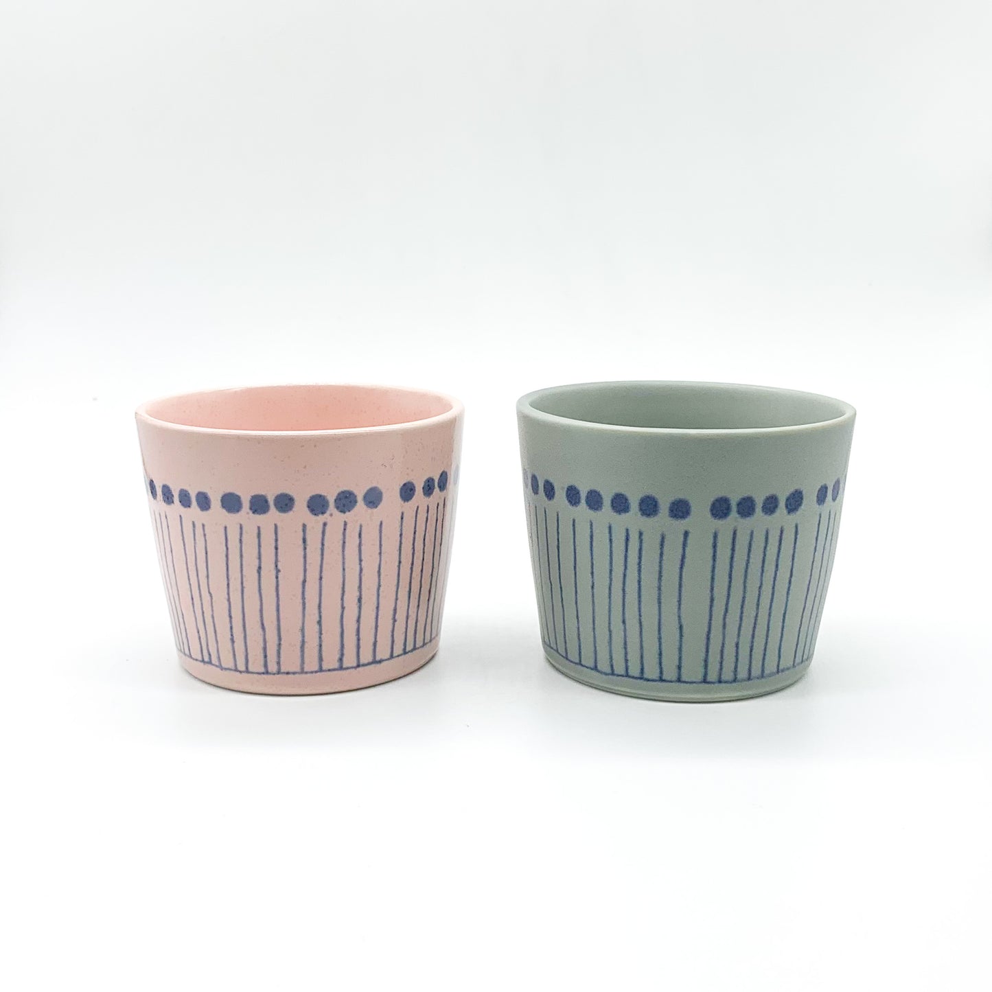 A Pair of Cups with Lids